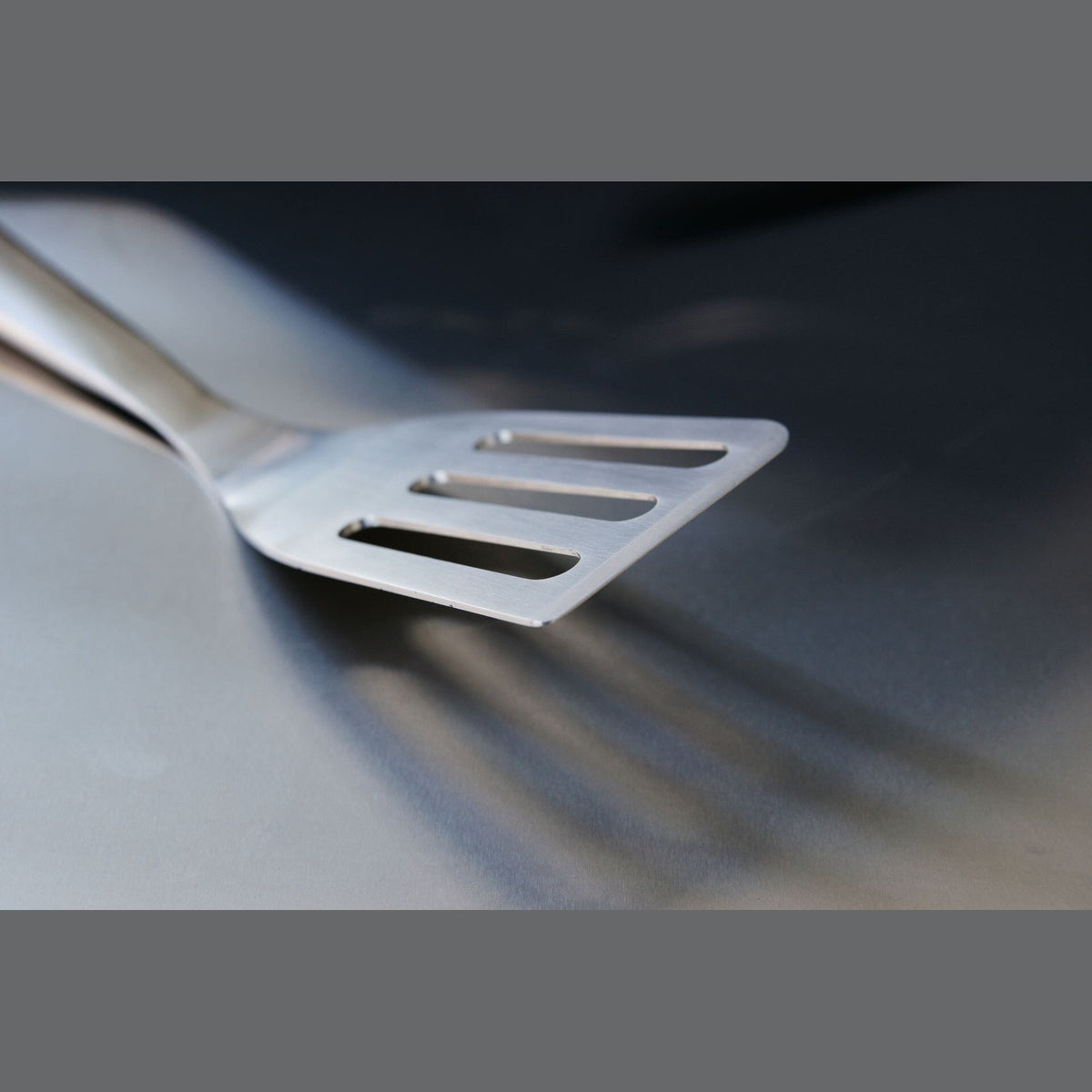 ملعقة OutdoorChef - أداة طهي للشواء